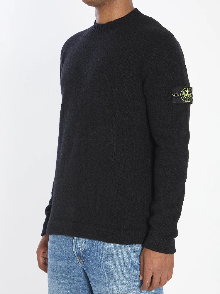 Crew neck sweater with brushed texture. alternative