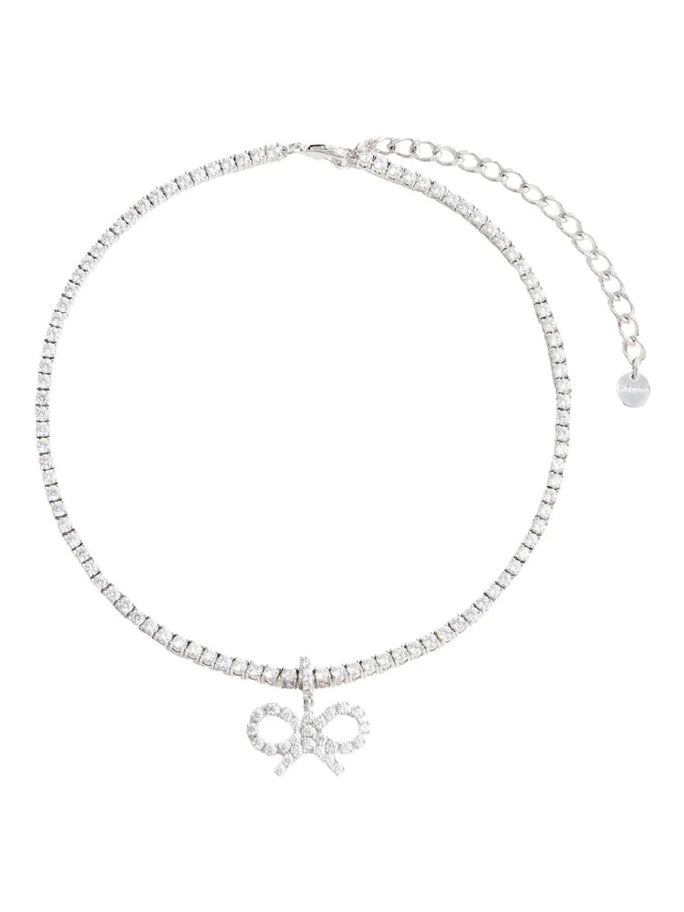 Metallic Tennis Necklace with Bow Charm and Crystal Embellishments in Brass Woman