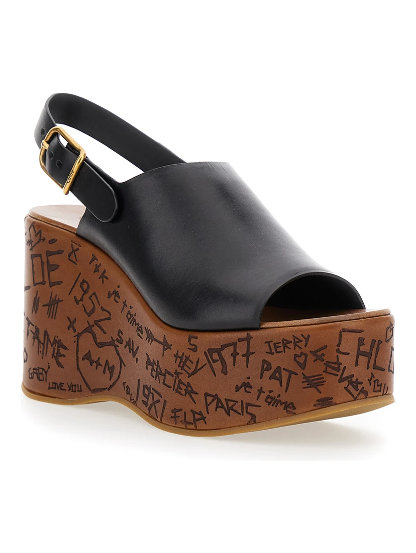 Maxime Black Wedge with Engraved Written Decorations and Logo Buckle in Leather Woman