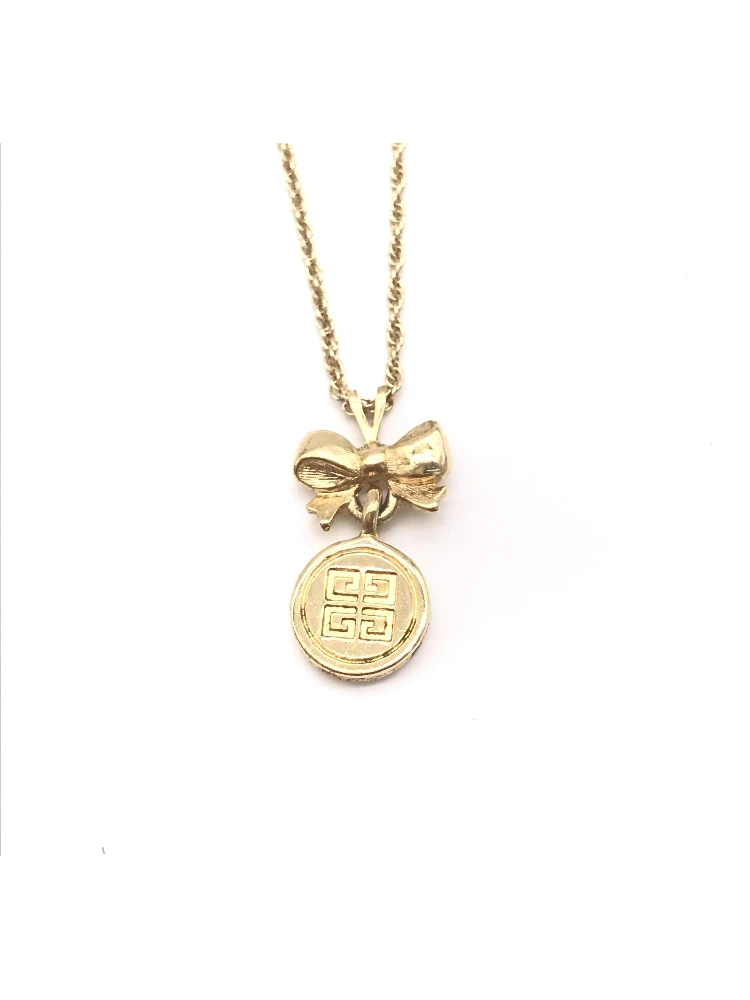 Gold Tone Bow Pendant Chain Necklace alternative
